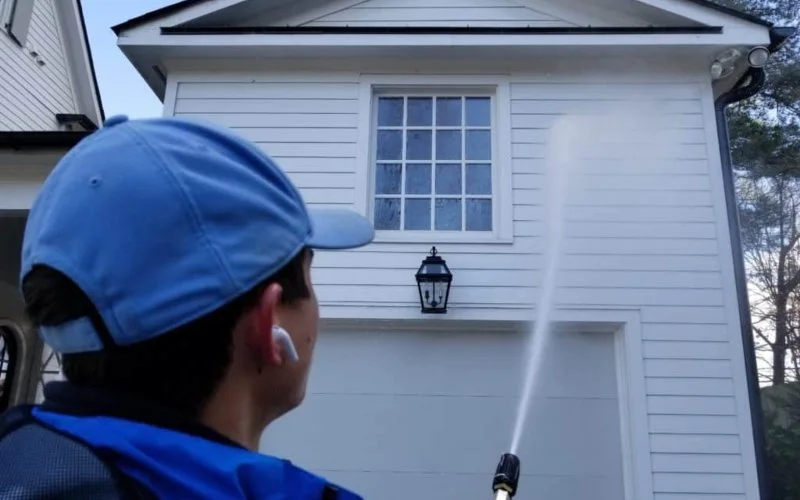 Power washing siding